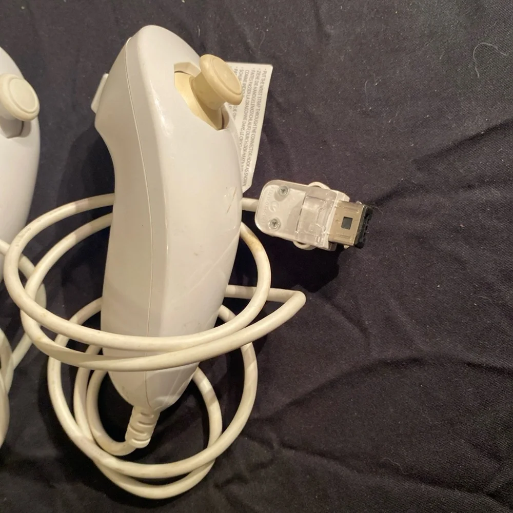 Nintendo Red and White Motion Nunchuk Controllers
